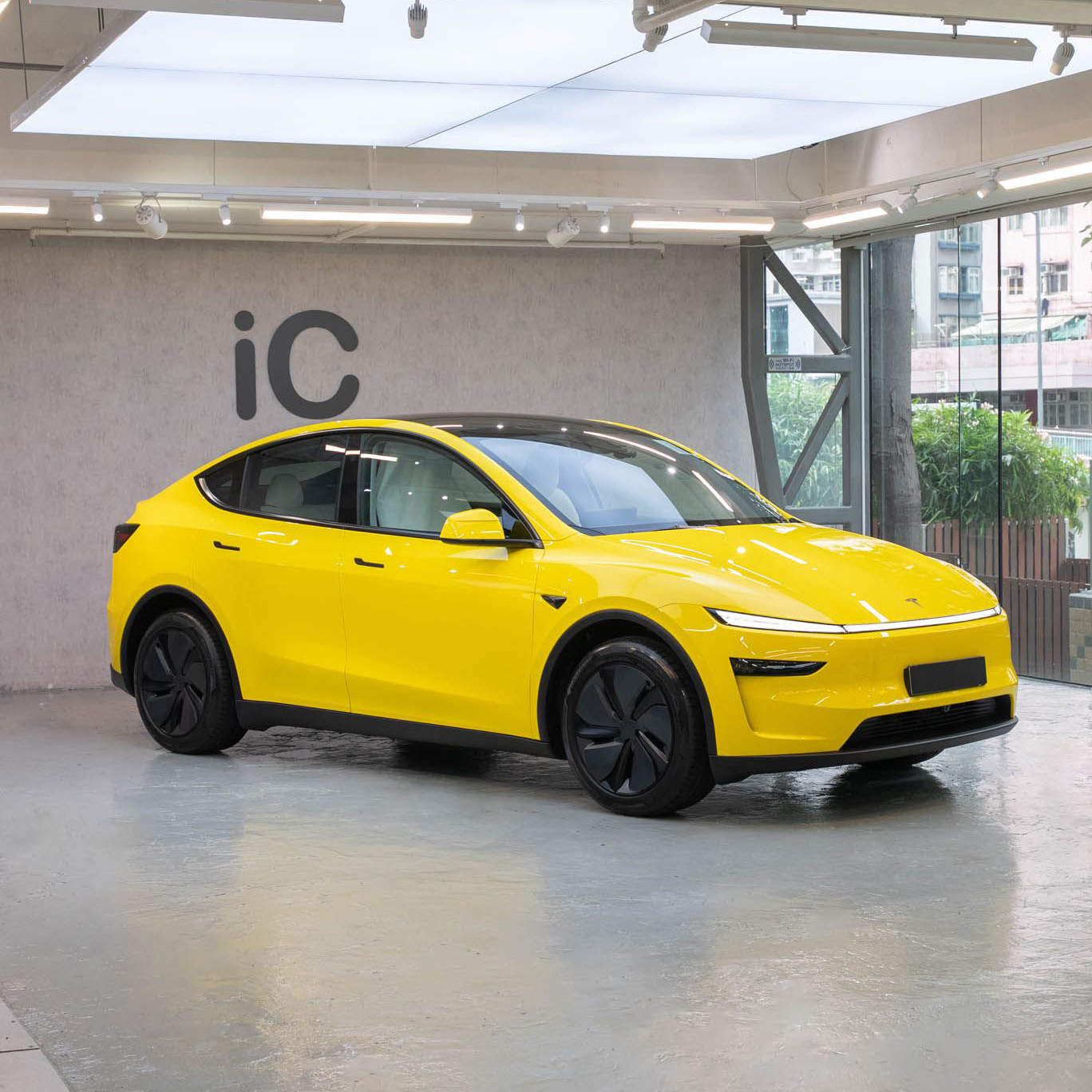 Signal Yellow Tesla Model Y Juniper